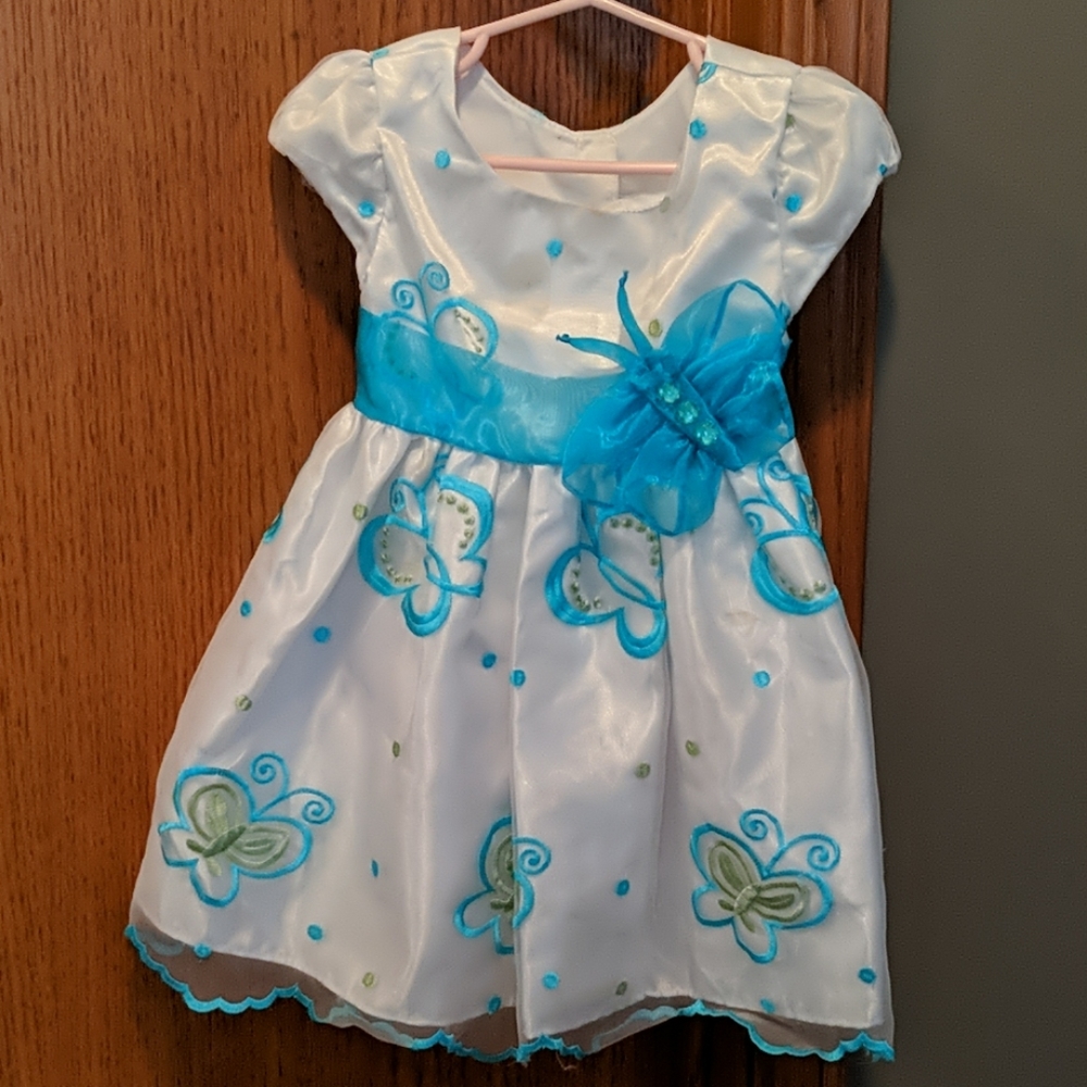 White and turquoise dress